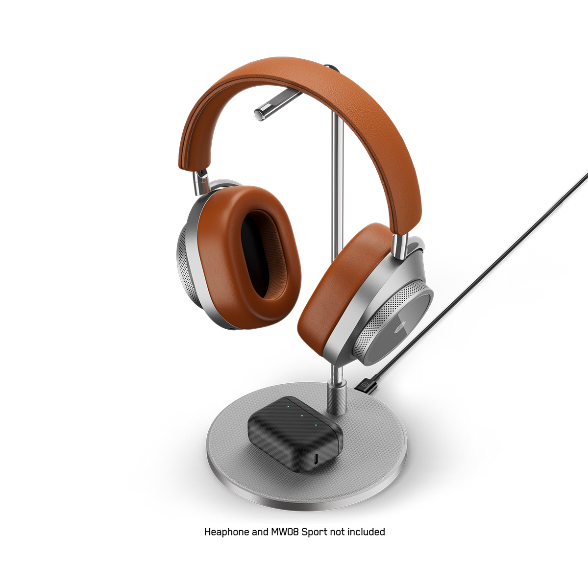 Stand with headphones and a black earbud case charging on the pad