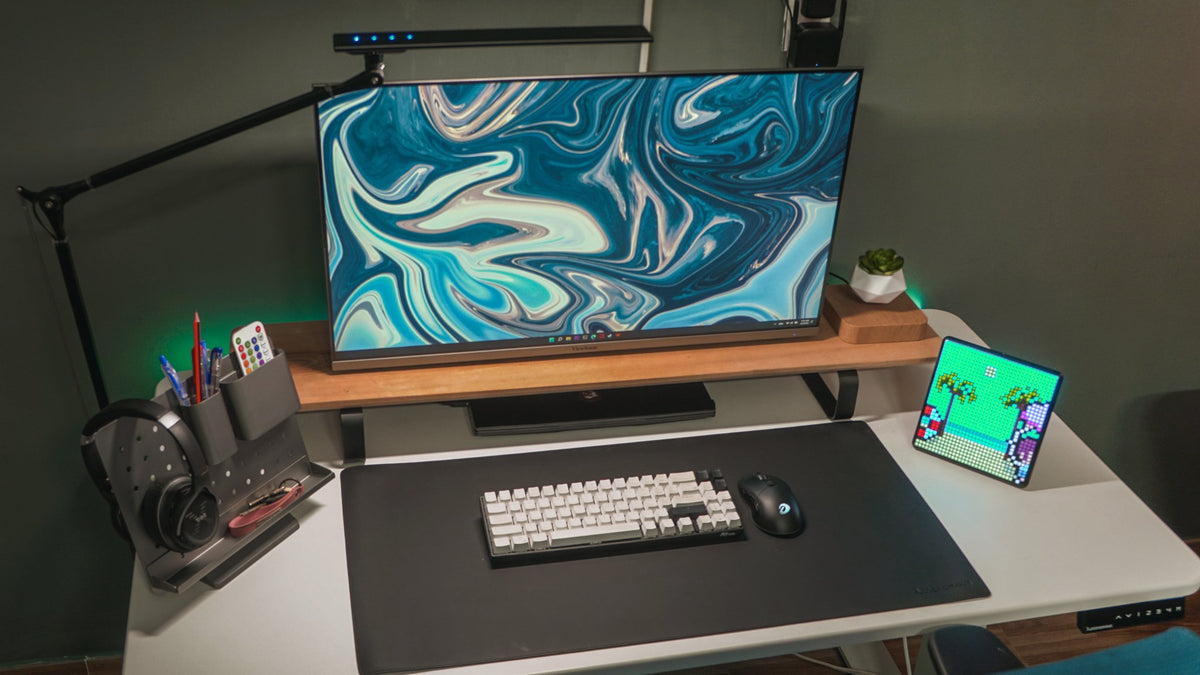 Wood monitor shelf desk with a blue marble screen and a pixel art display