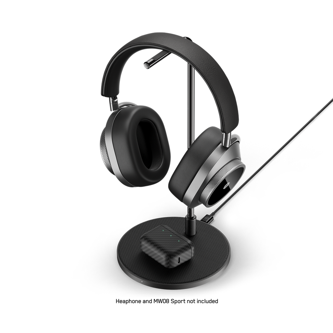Black stand with headphones and an earbud case on the charge pad