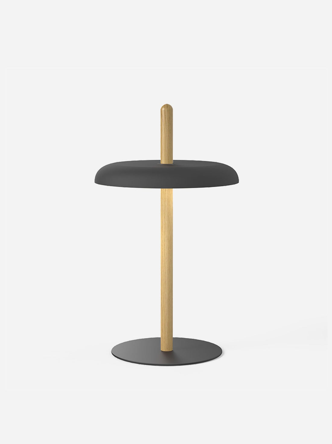 The Nivel table lamp with a black shade on a light oak post and a black steel base
