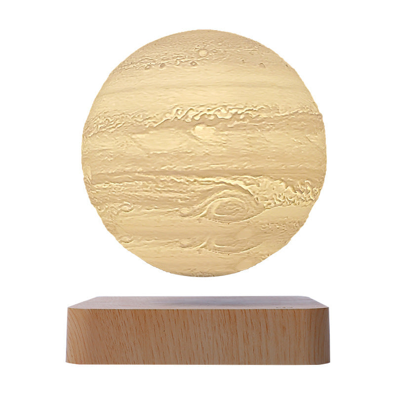 Jupiter globe in warm yellow floating above a light wood-grain base